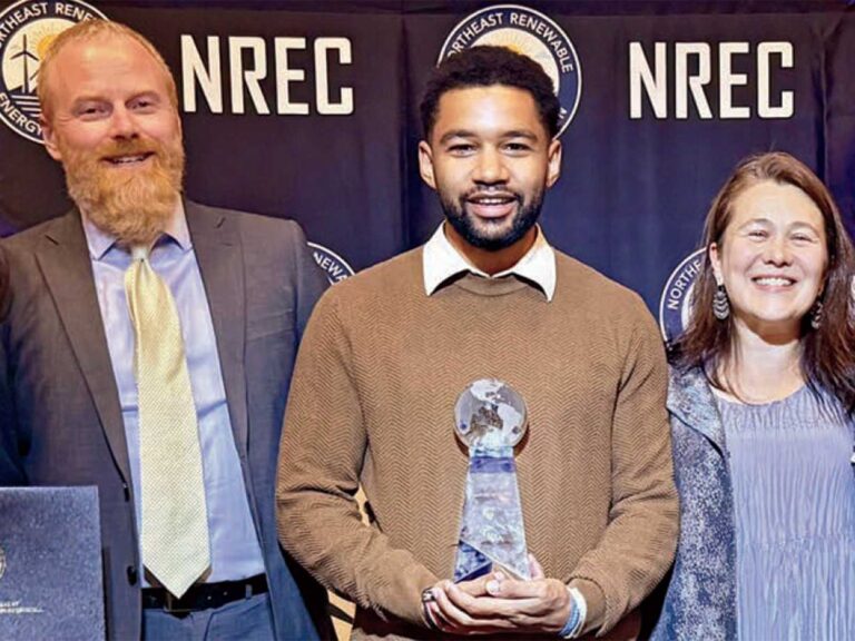 Eric Juma '12 with his HEET colleagues